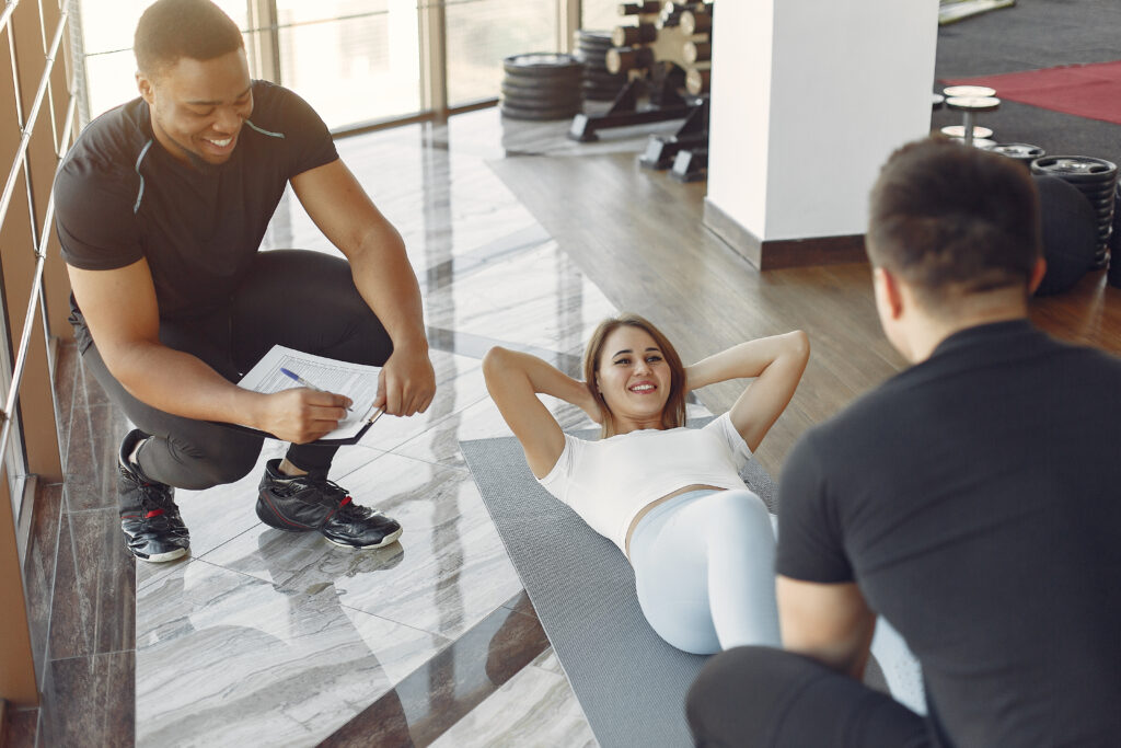 Fitness owner with client